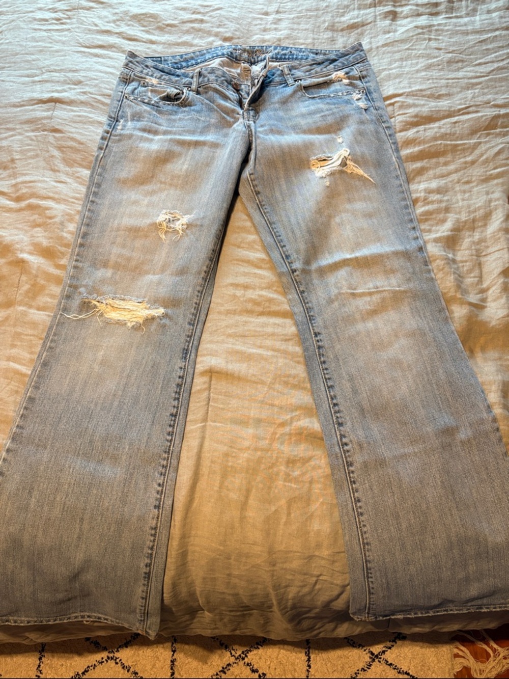 American Eagle Outfitters Faded Light Blue Distressed Flare Jeans